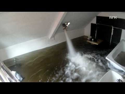 Collapsing floor by filling room with water